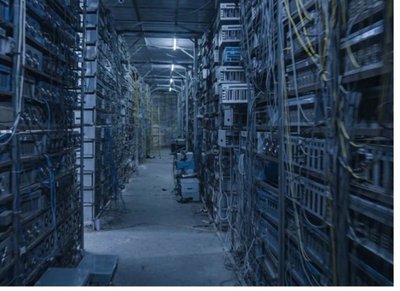 An expansive mining farm setup with multiple rigs in operation.